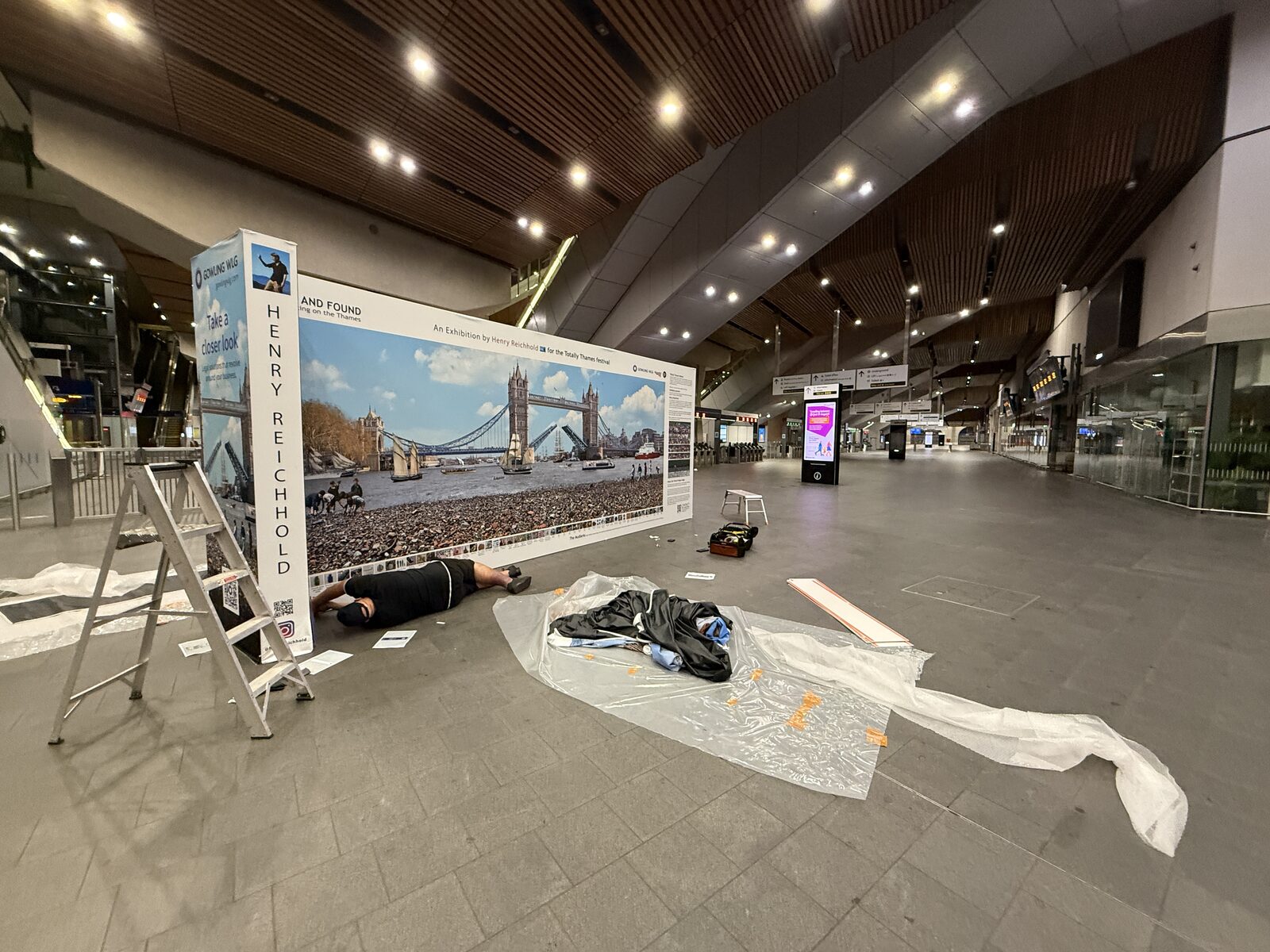Giclee London team installing the exhibition stand overnight